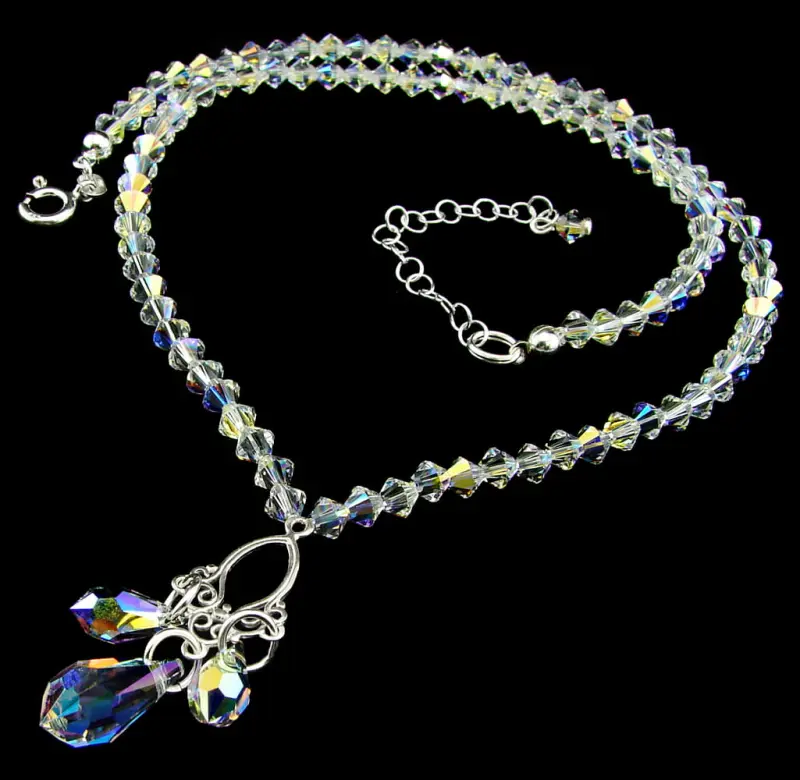 opalizujący srebrny naszyjnik z oryginalnymi kryształkami crystal ab z sopelkami sopelki