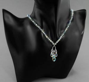 opalizujący srebrny naszyjnik z oryginalnymi kryształkami crystal ab z sopelkami sopelki