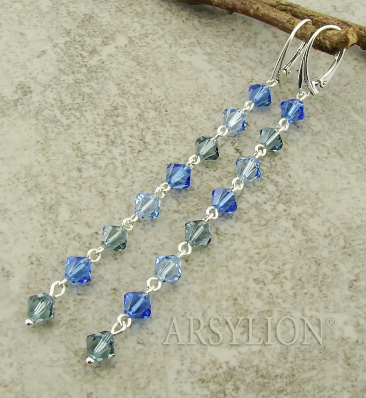 srebrne długie kolczyki z kryształkami sapphire łańcuszki