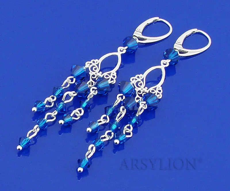 srebrne długie szafirowe kolczyki z oryginalnymi kryształami capri blue