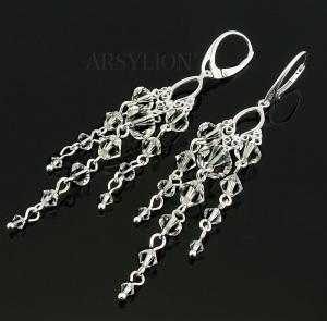 długie srebrne błyszczące kolczyki z oryginalnymi kryształkami crystal